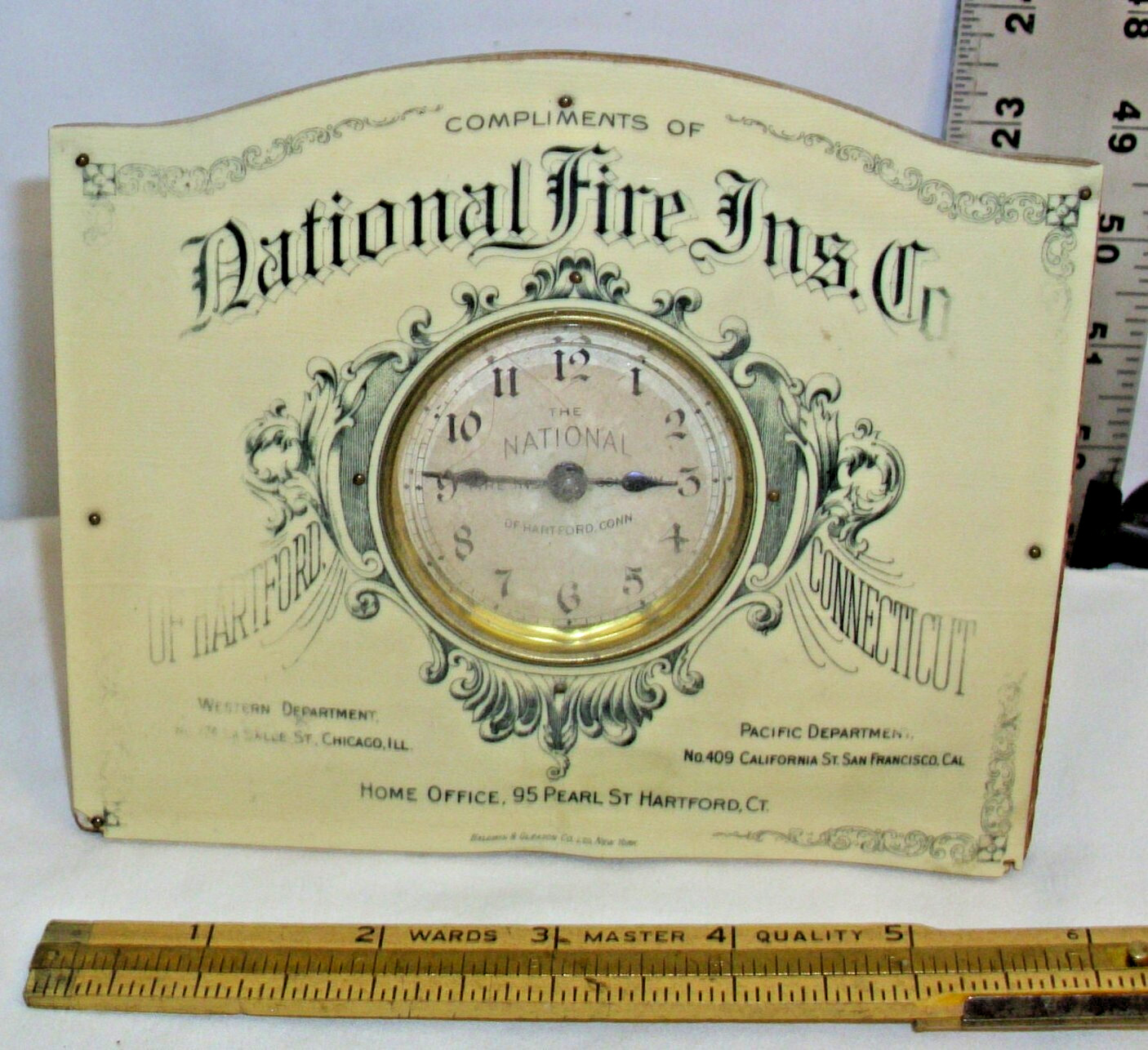 NATIONAL FIRE INSURANCE CO. CELLULOID ADVERTISING CLOCK 1920s