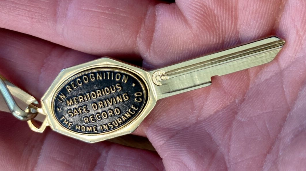 Vintage The Home Insurance Co Safe Driving Record Award Brass Keychain C17a