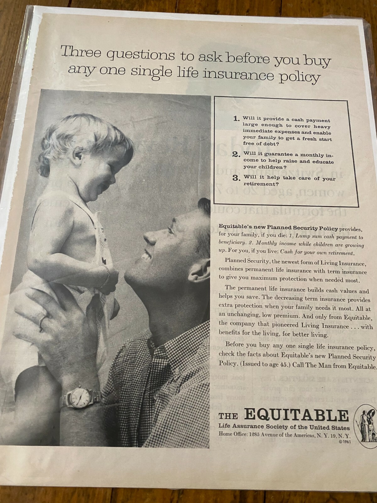 1961 Equitable Life Insurance Three Questions To Ask Father Holding Child ad