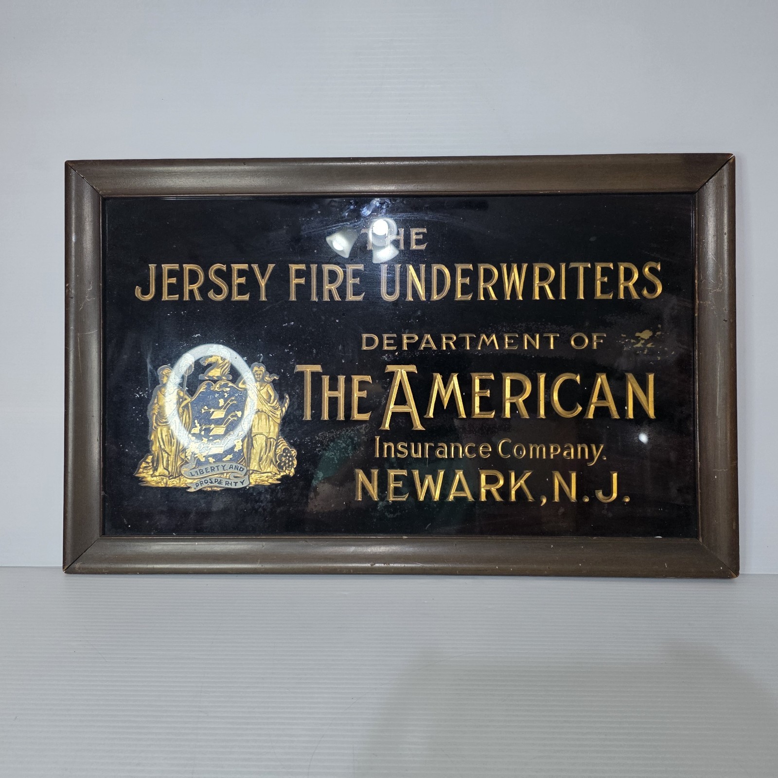 The American Insurance Company Vintage Sign Reverse Glass Painted Jersey Fire