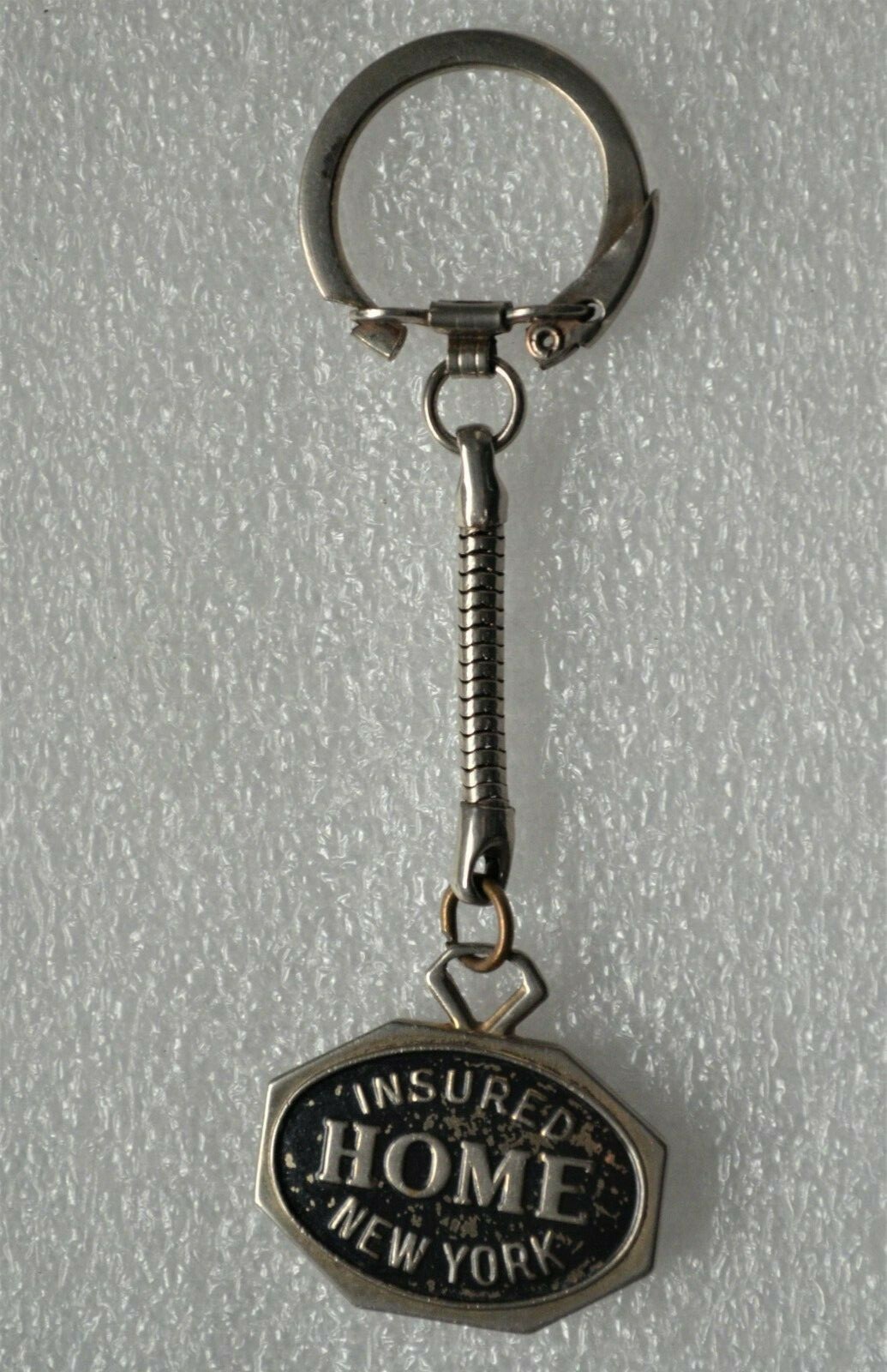 THE HOME INSURANCE CO. Vintage MERITORIOUS SAFE DRIVING RECORD KEY-RING KEYCHAIN