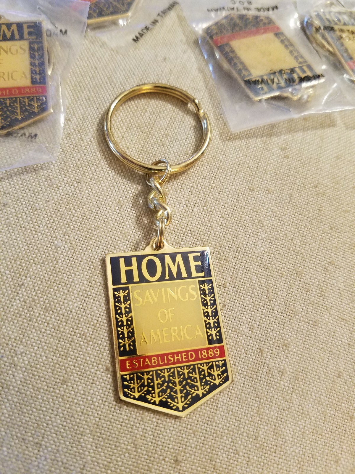 Vintage Advertising Bank Keychain Home Savings of America Metal Goldtone NOS