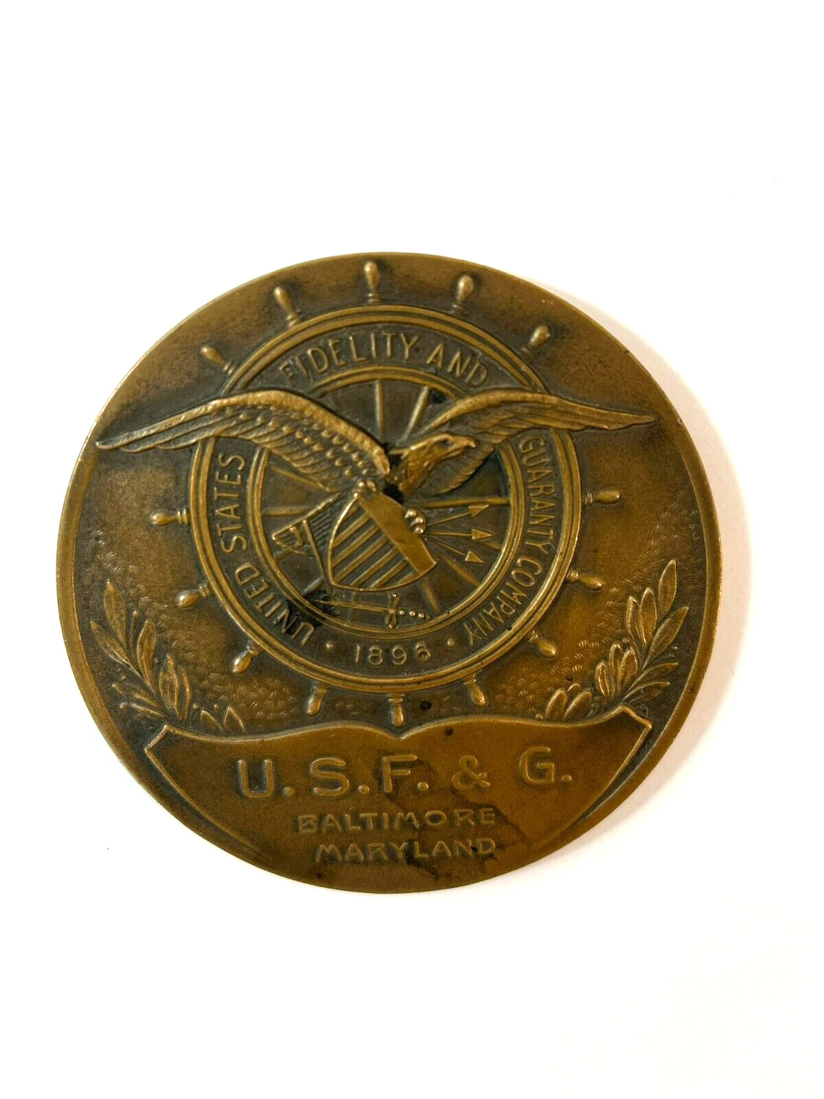1946 UNITED STATES FIDELITY & GUARANTY BRASS ADVERTISING PAPERWEIGHT – 1896-1946