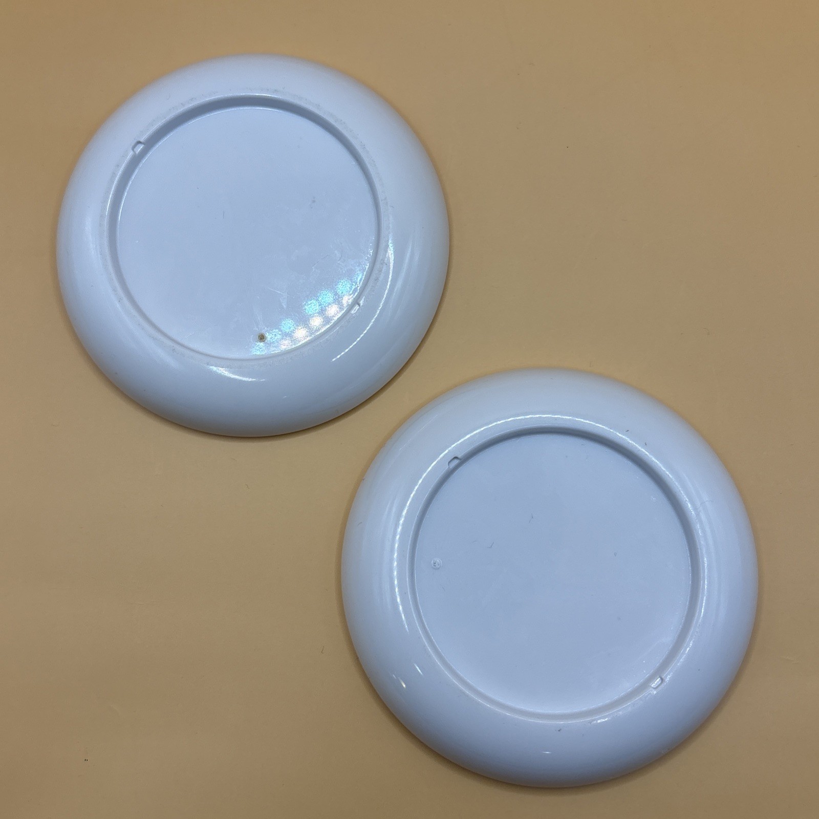 2000 Lot of Two (2) State Farm “Leap into the Year” Plastic 3.5″ Round Coasters
