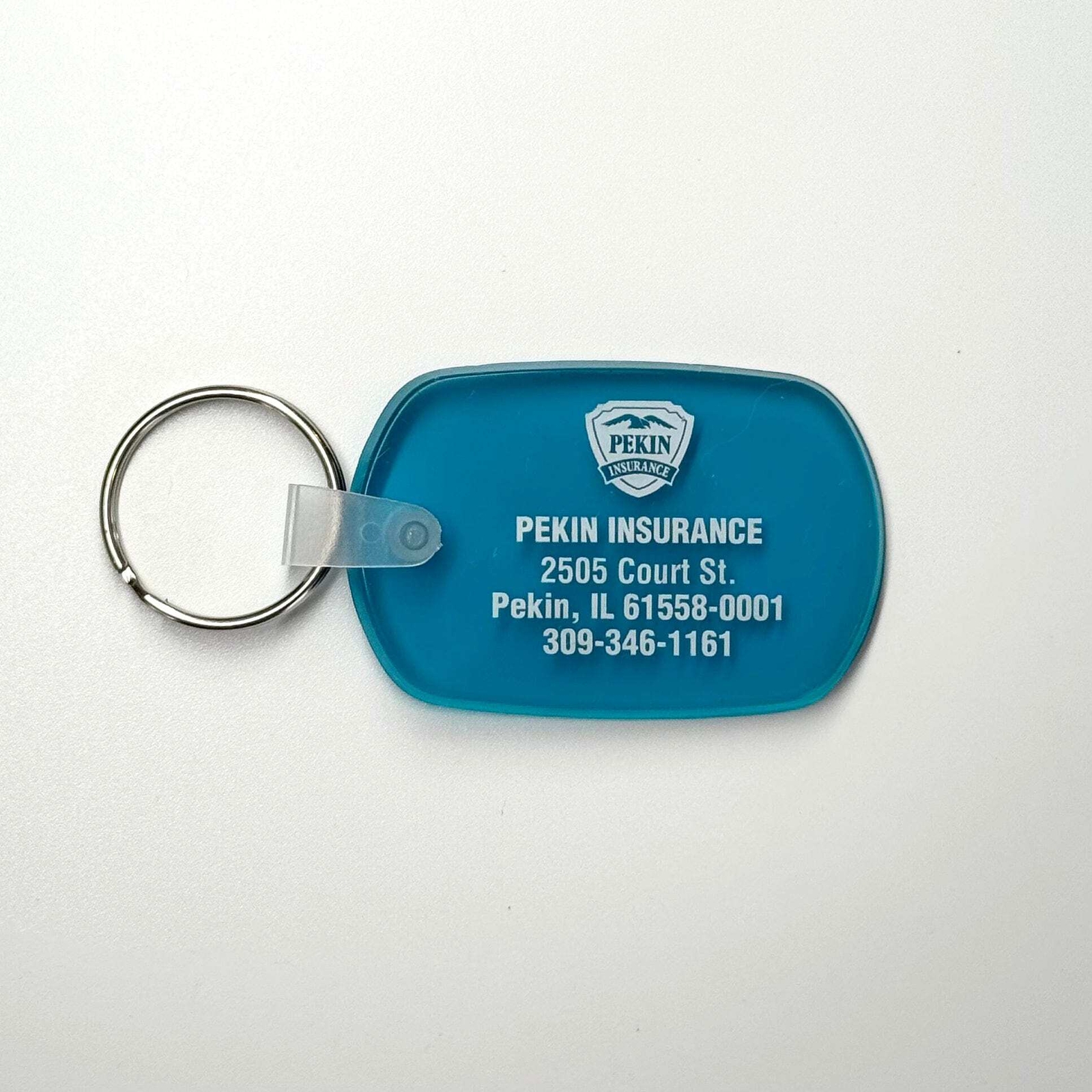 Vintage ‘Pekin Insurance – Pekin, IL’ Keychain Key Ring Blue Rubber Oval