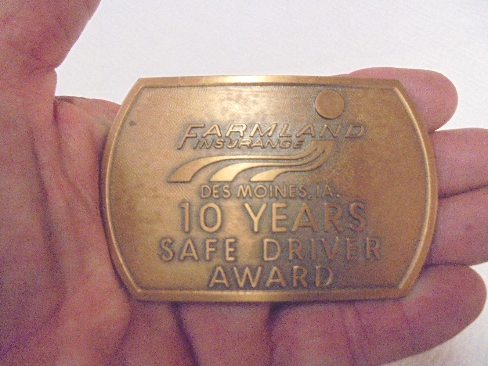metal belt buckle farmland insurance des moines iowa 10 year safe driver award