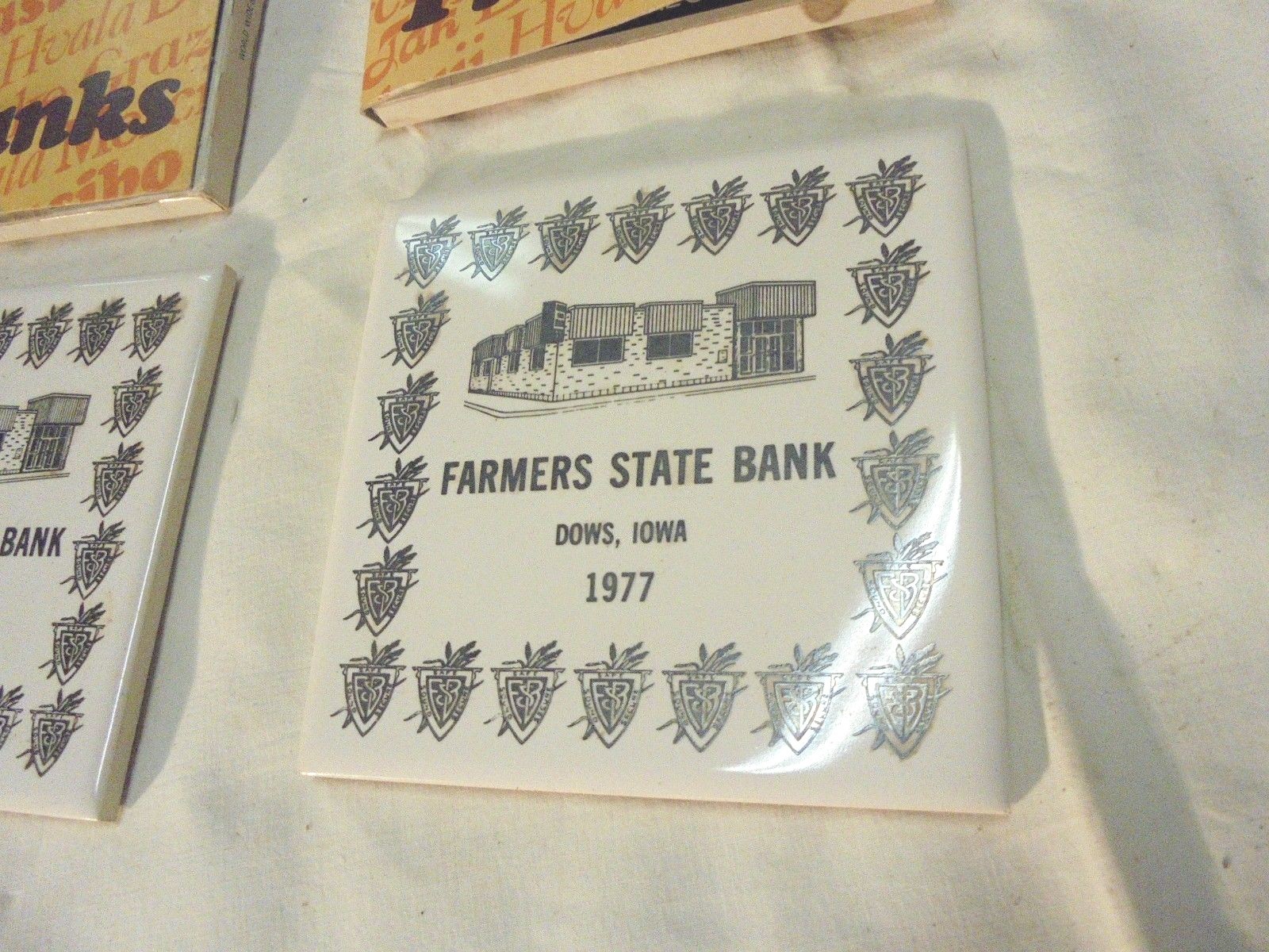 2 ceramic coasters farmers state bank dows iowa 1977