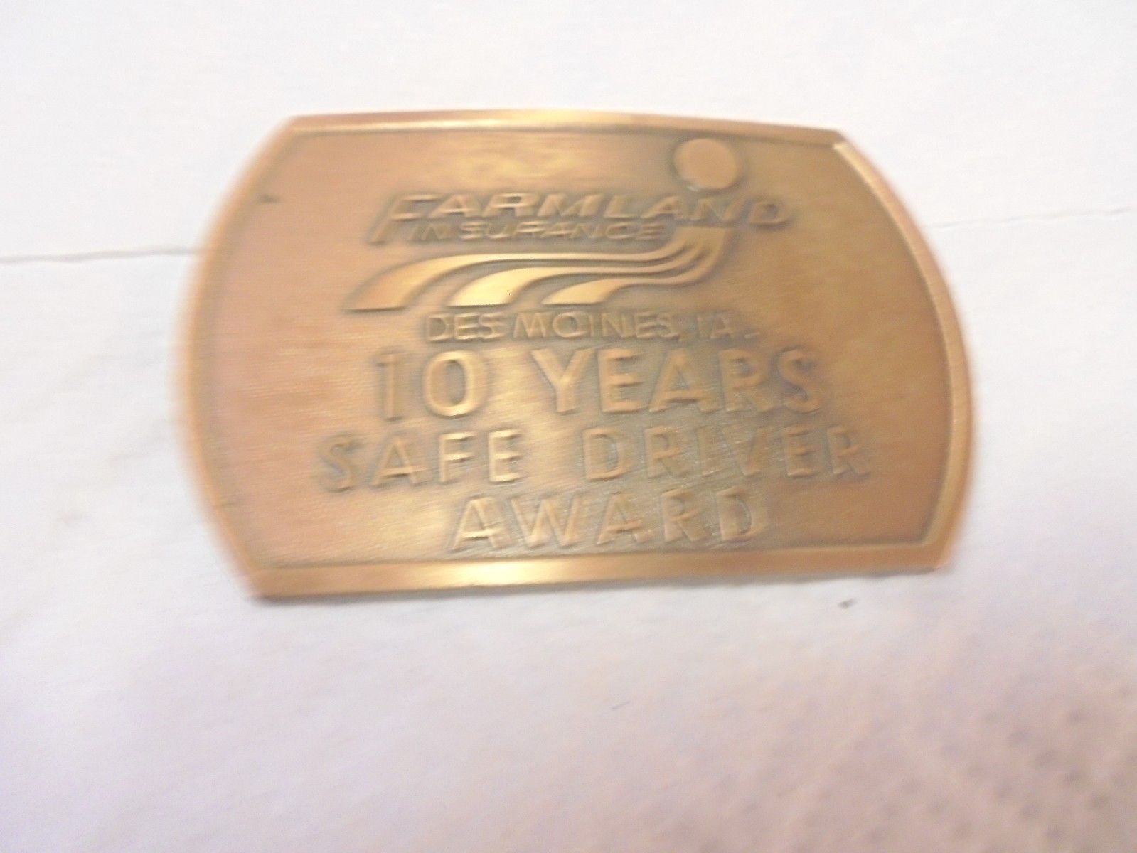 metal belt buckle farmland insurance des moines iowa 10 year safe driver award
