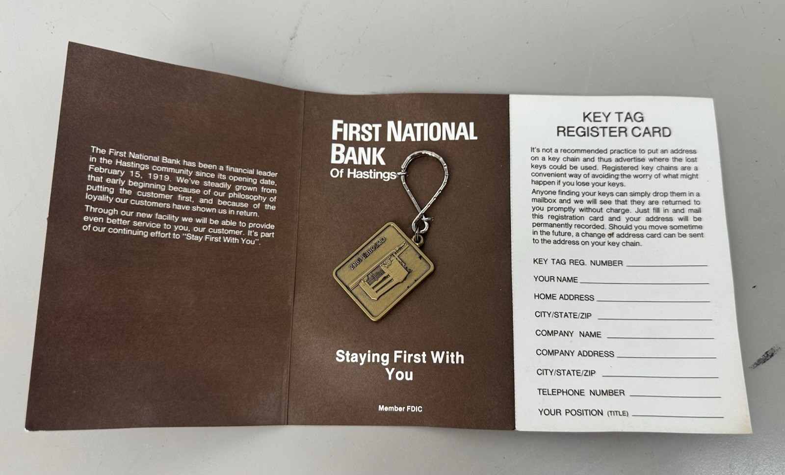 Vtg Hastings NE Brass Key Fob original Brochure Registration Card, Unused 1970’s