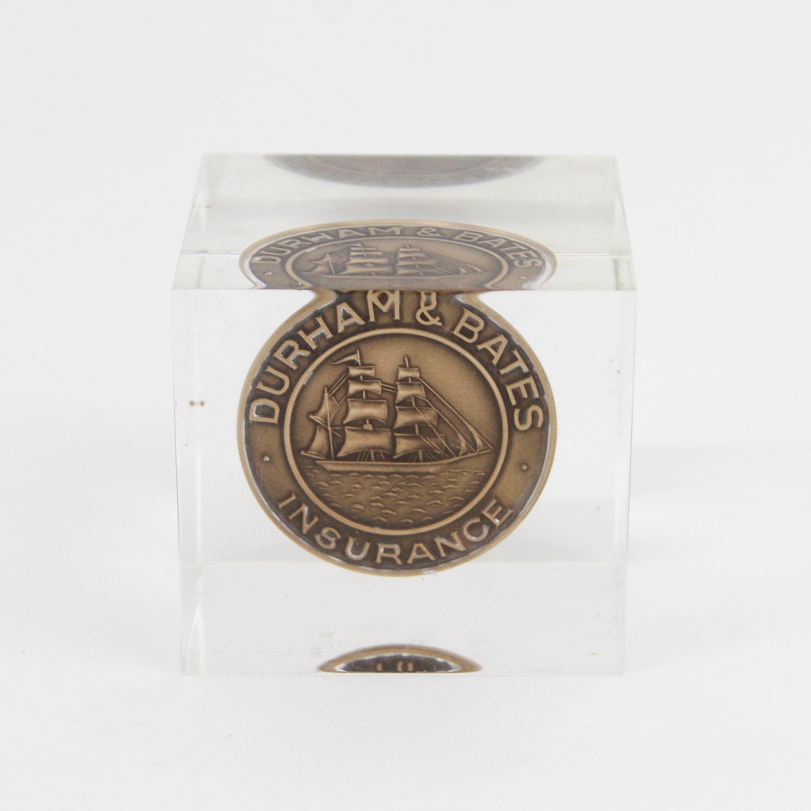 Durham Bates Insurance Bronze Token In Lucite Paperweight
