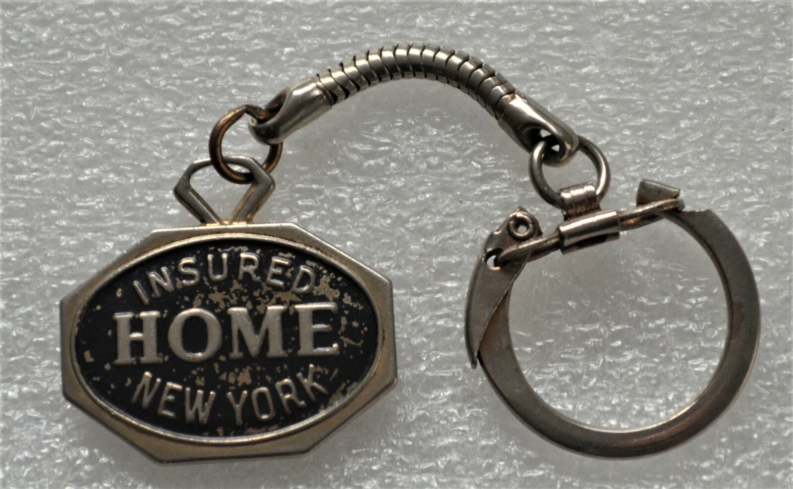 THE HOME INSURANCE CO. Vintage MERITORIOUS SAFE DRIVING RECORD KEY-RING KEYCHAIN