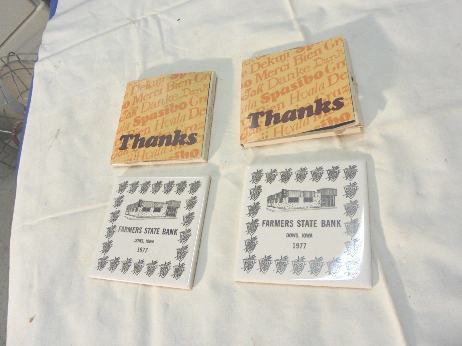 2 ceramic coasters farmers state bank dows iowa 1977
