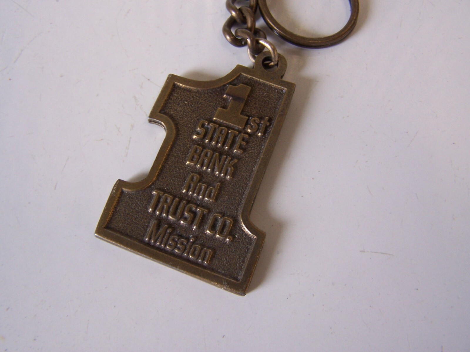 Vintage 1st STATE BANK and TRUST CO. MISSION Metal Keychain