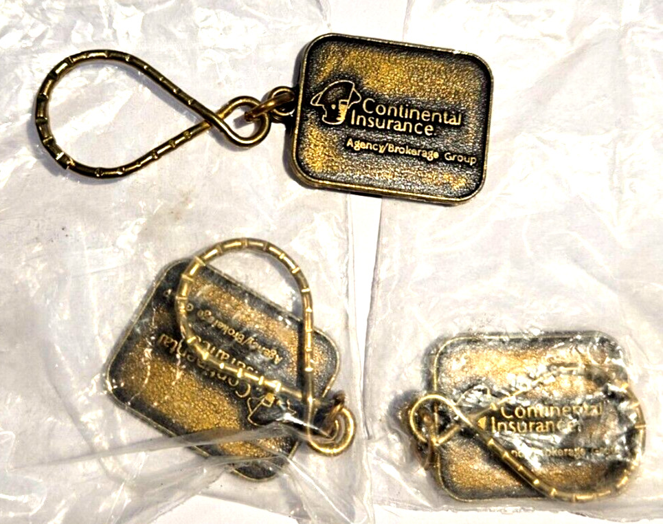 Lot of Three Metal Continental Insurance Key to Superior Service Keychains