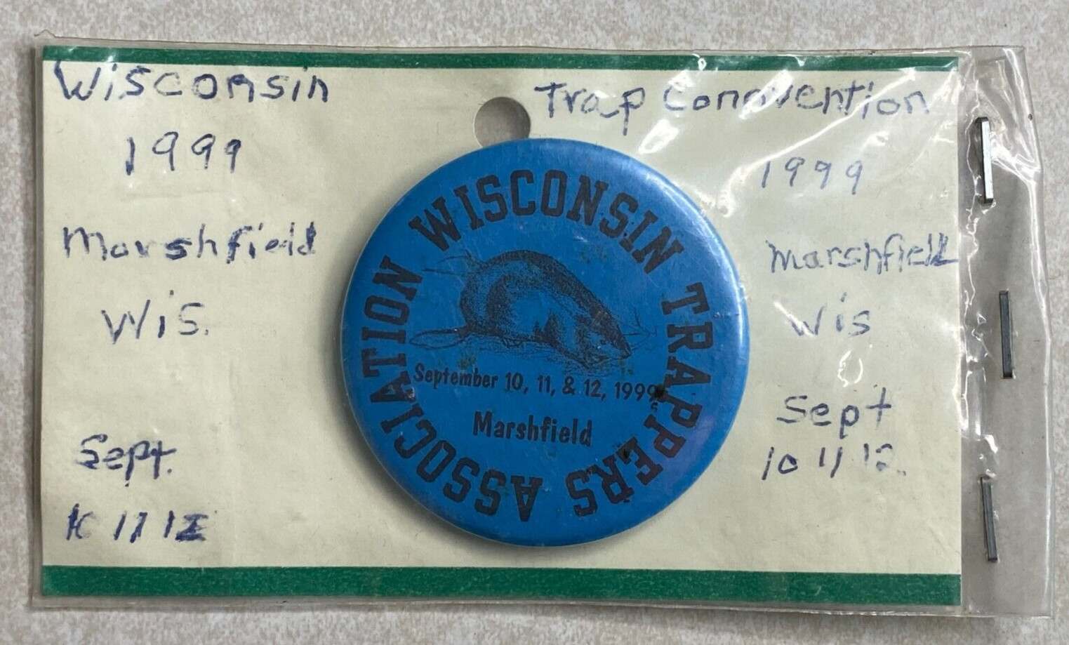 Trapper Button Pinback 1999 Marshfield Wisconsin Trappers Ass. advertising ADT41