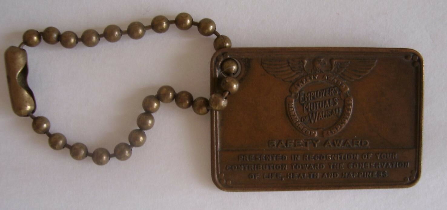 EMPLOYERS MUTUALS OF WAUSAU: Insured by Identification Fob/Mark/Medallion/Coin