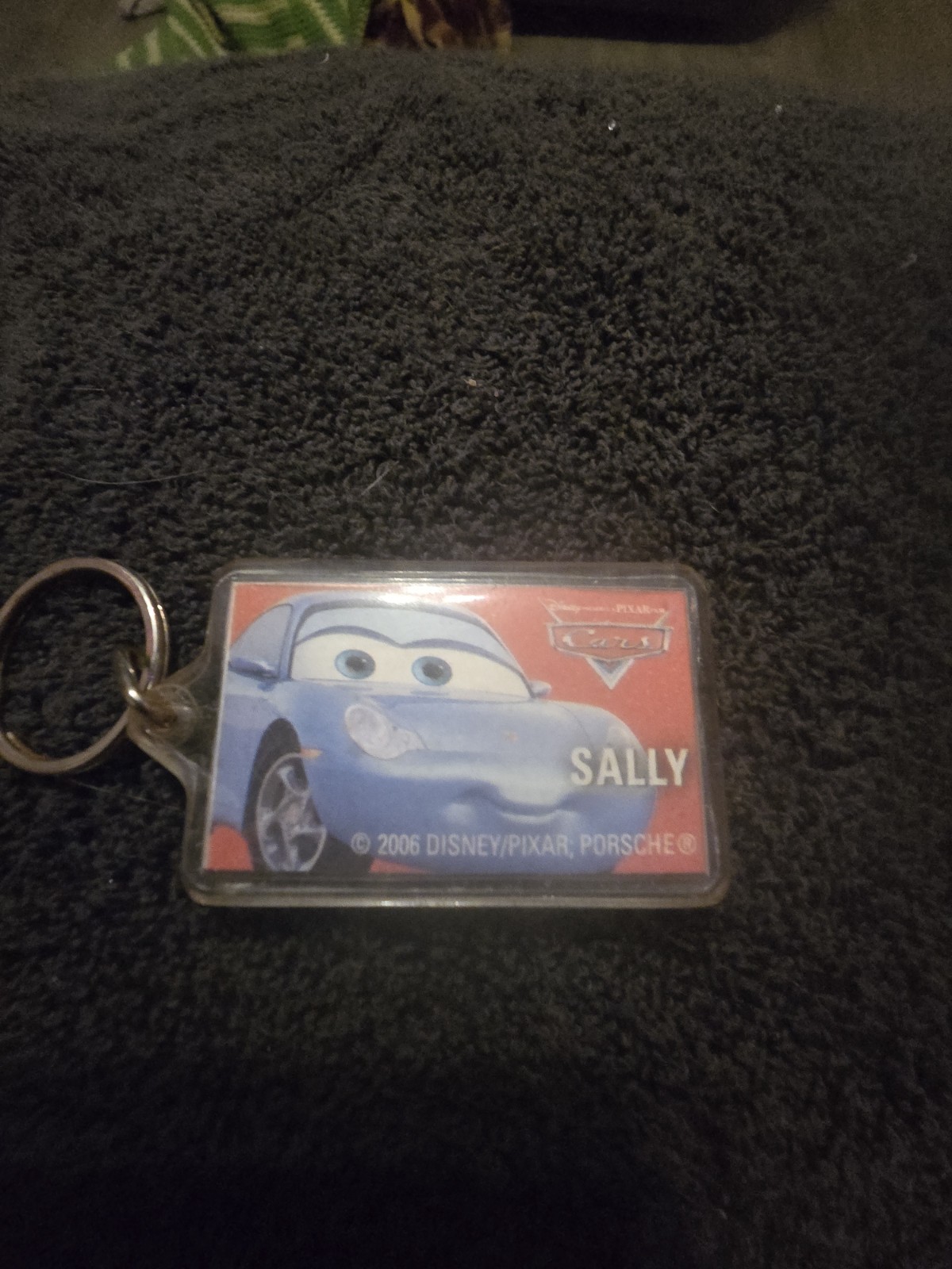 2006 Disney Pixar Clear Acrylic State Farm Cars Movie Sally Keychain- 2″ x 1.25″