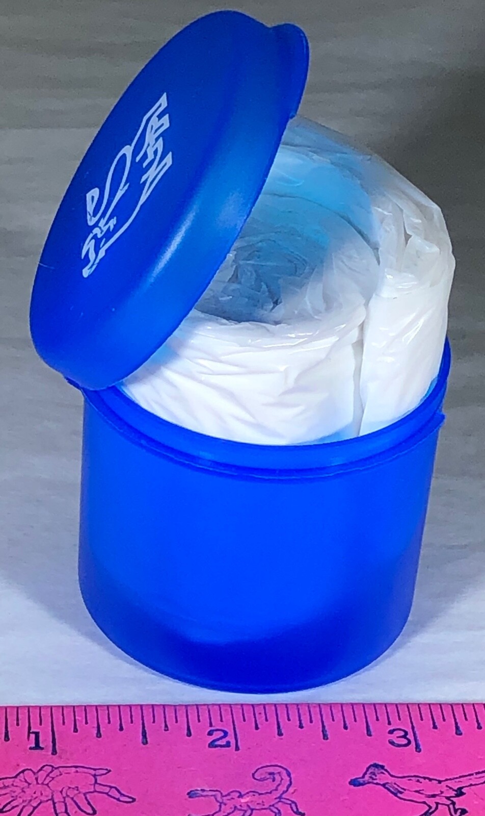 POCKET RAIN PONCHO IN BLUE PLASTIC CASE WHITE CARABINER MERRILL LYNCH BULL LOGO