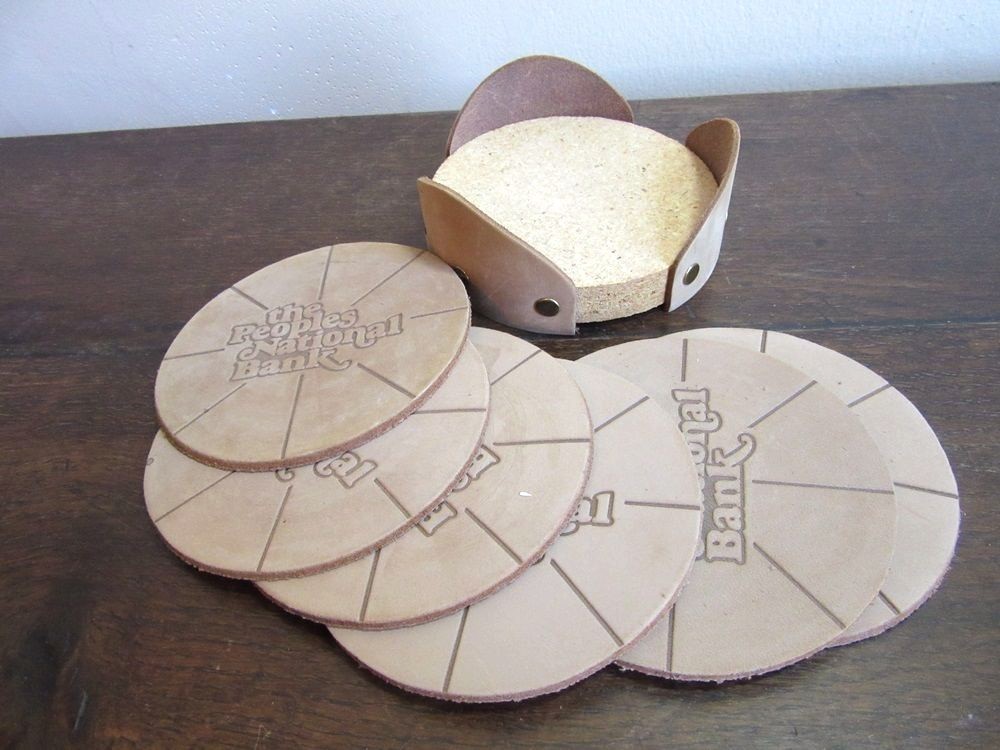 Leather advertising drink coasters. The Peoples National Banl