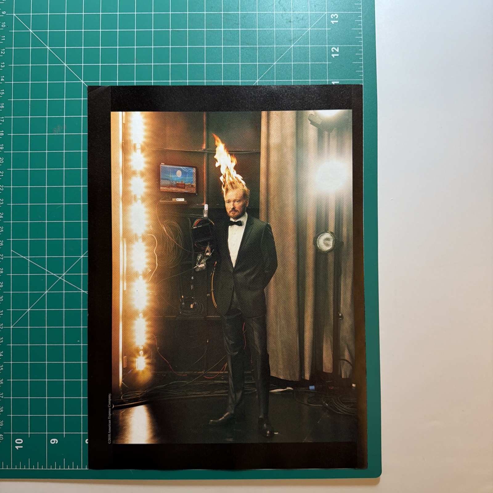 2011 American Express 2 pg PRINT AD Conan O’Brien Stage Lights Tuxedo Hair Fire