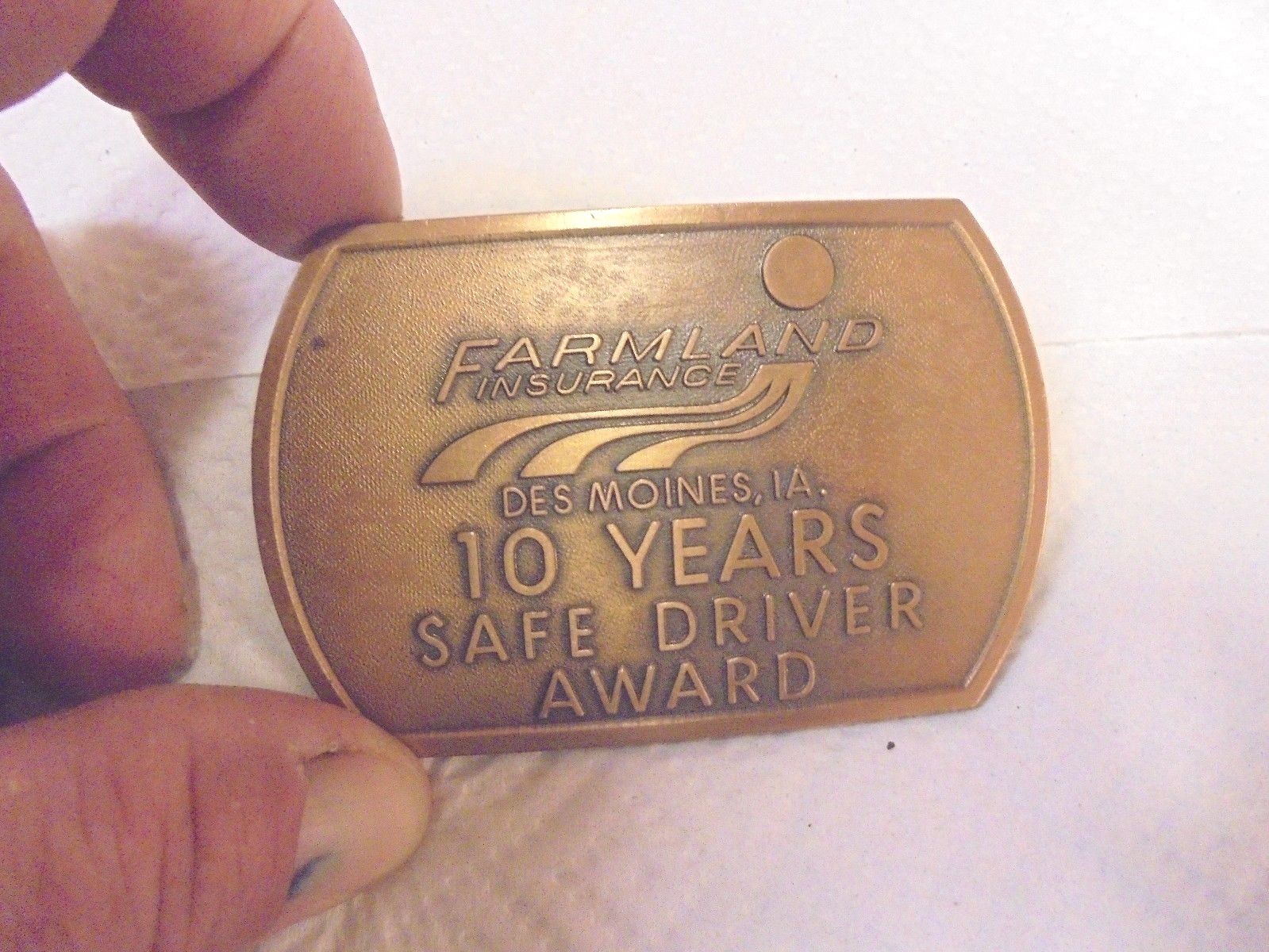 metal belt buckle farmland insurance des moines iowa 10 year safe driver award