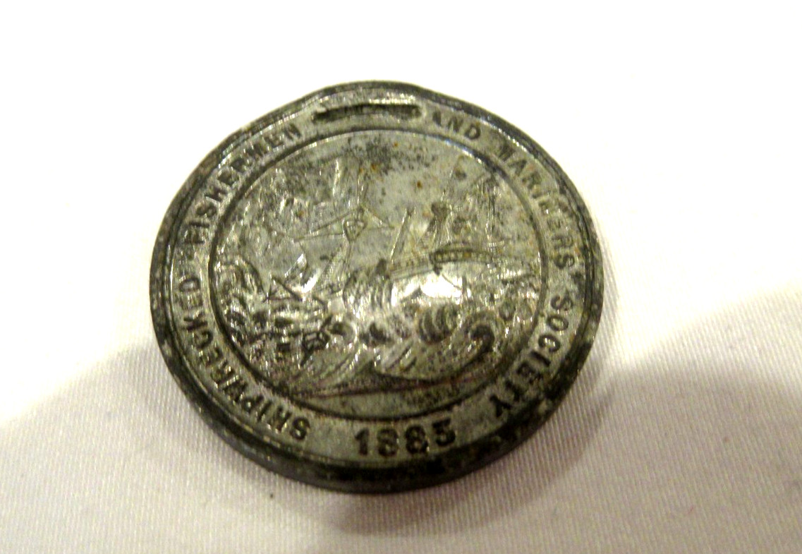 Shipwrecked Fishermen and Mariners Society member coin, 1885