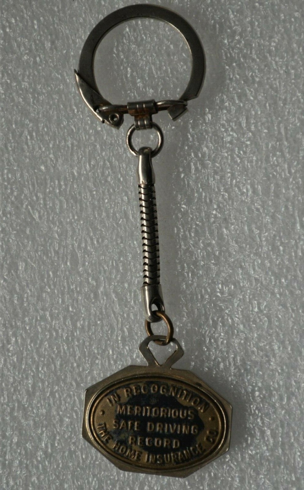 THE HOME INSURANCE CO. Vintage MERITORIOUS SAFE DRIVING RECORD KEY-RING KEYCHAIN