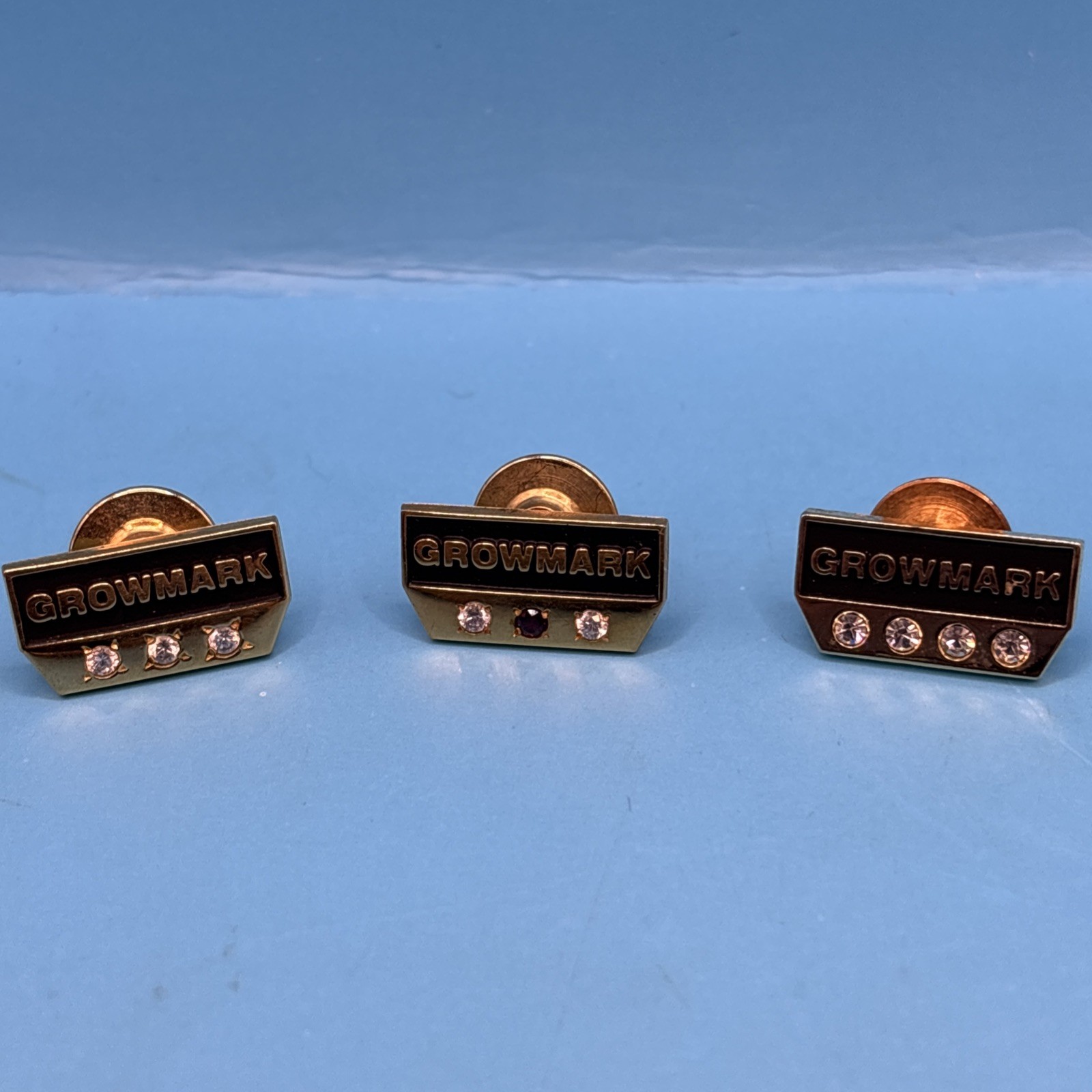 Lot of Three (3) GROWMARK Lapel Pins