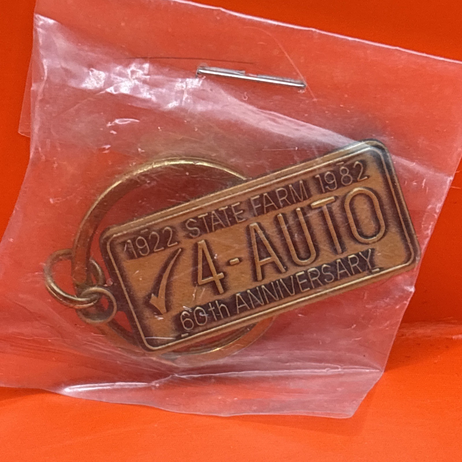1982 State Farm 60th Anniversary “4-AUTO” License Plate 2.5″ Metal Keychain- NIP