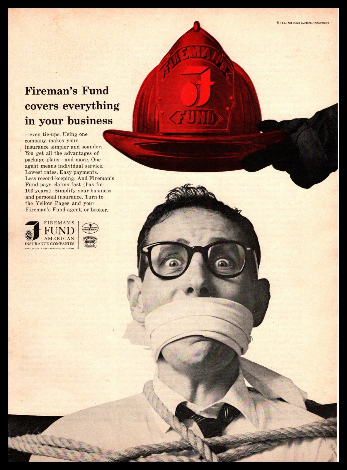 1966 Fireman’s Fund Insurance Fire Helmet Man Tied Up & Gagged Vintage Print Ad
